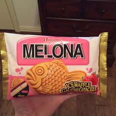 someone is holding up a bag of melona