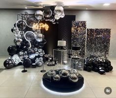 a room filled with black and white decorations