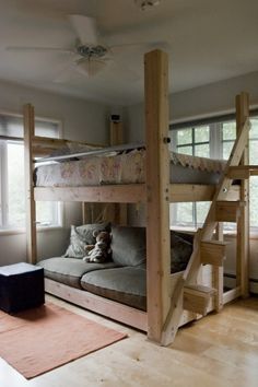 a bunk bed with a couch underneath it and the word pinterest above it