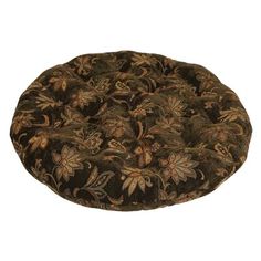 a round dog bed with floral designs on it