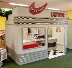 an old diner booth in a toy store