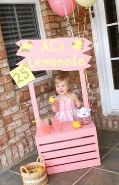 a child's lemonade stand on the front porch