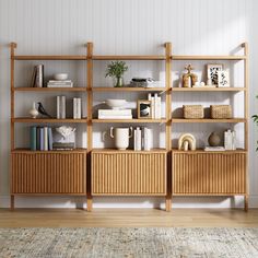 a wooden shelf filled with books and vases on top of a carpeted floor