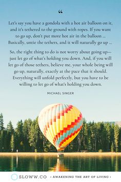 a hot air balloon flying over a lake with a poem written in the bottom right corner