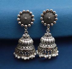 Oxidized Earring, German Silver/ Silver Look Alike Jhumka / Jhumki Earring | Afghan | Oxidised Bollywood Indian Jewelry | Pakistani Jhumka, Gift for Her Dimensions: Length : 2.8 inches approx Width : 1 inch approx Weight : 0.8 oz / 23 grams Color, shades, texture displayed may slightly vary from the actual product due to digital image limitations. We request you to consider these minor variations. Please expect the possibility of some slight imperfections when buying handmade jewelry. Please let Oxidized Jhumka, Pool Gifts, Jewelry Pakistani, Jhumki Earrings, Bollywood Jewelry, German Silver, Buy Handmade, Silver Earring, Look Alike