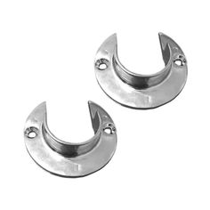 pair of stainless steel circular studs on white background