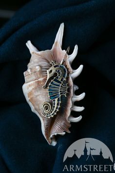 Enamel and brass seahorse earrings “Sea Born” for sale. Available in: brass :: by medieval store ArmStreet Seahorse Earrings, Medieval Boots, Archery Gear, Fantasy Earrings, Ocean Earrings, Seahorse Necklace, Larp Armor, Gothic Shoes, Ocean Necklace