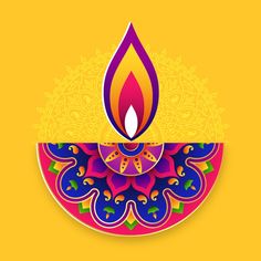 a colorful diya with a lit candle on it