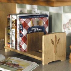 a wooden book stand holding several books