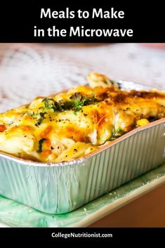 a casserole dish with broccoli and cheese in it on a green plate