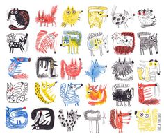 an image of children's hand drawn animals on white paper with colored crayons