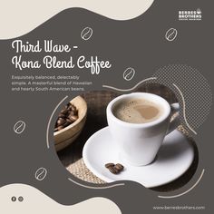 there is a cup of coffee and some nuts on the table with text that reads third wave - kona blend coffee