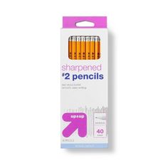 four orange and pink pencils in a box on a white background with the words sharpened