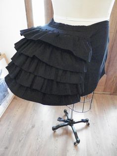 a woman's black skirt on a mannequin