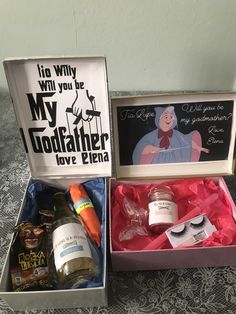 an open box with some items in it and a sign that says, i do why will you be my godfaither love friend?