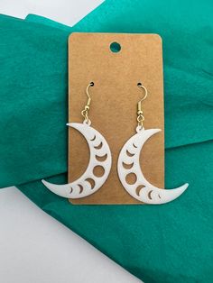 3D printed crescent moon earrings with silver plated backings.  Stylish and Sustainable: Biodegradable Earrings Because these are 3D Printed they can display layer lines, which is part of the printing process. If you have questions, please feel free to contact me! White Moon-shaped Earrings As Gift, Moon-shaped White Earrings For Gift, White Round Moon Phase Earrings, White Moon-shaped Earrings For Gifts, White Moon-shaped Earrings For Pierced Ears, White Crescent Earrings As Gift, White Crescent Earrings For Gift, White Crescent Earrings For A Gift, Biodegradable Earrings