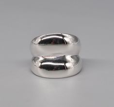 GEORG JENSEN 501 Vintage Danish Modernist 925 Sterling Silver Curve Ring.  Marked: Fully marked. Without original box. Design by Regitze Overgaard. Pre-owned, in superb visual condition. Measurement: Size: 19.5 mm US/CAN 9.5 Weight: 19.28 grams / 0.683 OZ. Modernist Silver Dome Ring As Gift, Modernist Engraved Silver Jewelry, Modernist Sterling Silver Signet Ring, Modernist Sterling Silver Dome Ring, Modernist Hand-cast Sterling Silver Jewelry, Curve Ring, Georg Jensen, Estonia, Box Design