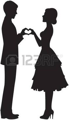 a man and woman in silhouette making a heart shape with their hands while standing next to each other