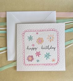 a birthday card with flowers and the words happy birthday