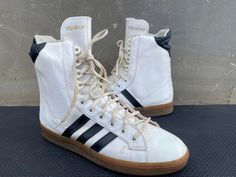 Adidas Hightop Adipromed west Germany UK 7.5 | US 8 Vintage Sneaker Awesome boots, check photos for clear visual description. PLEASE VIEW ALL PHOTOS CAREFULLY AS I CONSIDER THEM PART OF THE DESCRIPTION. I WILL GLADLY COMBINE SHIPPING FOR MULTIPLE ITEMS PURCHASED IF THEY CAN BE SAFELY SHIPPED TOGETHER. DELIVERY WITHIN 5 BUSINESS DAYS, 1-2 DAYS HANDLING ONCE YOUR PAYMENT CLEARS, THIS ITEM WILL COME PROFESSIONALLY PACKAGED AND SHIPPED WITH CARE. PLEASE CONTACT ME THROUGH MESSAGES IF YOU HAVE ANY QUESTIONS OR CONCERNS. THANKS FOR LOOKING Vintage Sneakers, Sneakers Athletic, West Germany, Cool Boots, Kenya, High Tops, Athletic Shoes, Shoes Sneakers, Fashion Inspo