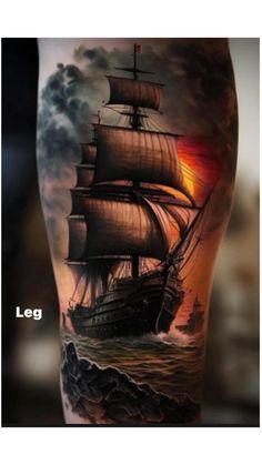 a man's leg with a ship on it