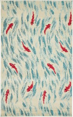 an area rug with red fish on it