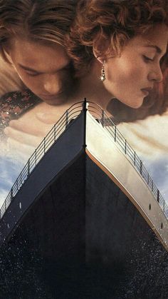 two people are kissing in front of a large poster for the movie bridge to tern