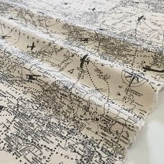 the fabric has been stitched together to make it look like an old map