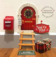 a red door with a sign that says north pole next to two boxes and a ladder