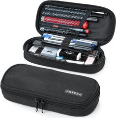 ARTZ-4446 Pencil-Holders, Black All-in-One Pencil Organizer and Bag: This black pencil case features a main compartment with a mesh pocket and 4 slots for pens and pencils. Item Package Dimension: 8.89L x 4.72W x 1.57H inches Item Package Weight - 0.17 Pounds Item Package Quantity - 1 Product Type - CARRIER BAG CASE Compact, Durable Pencil Pouch Design We designed our black pencil case so that you can stay organized all year round. This compact soft pencil case is made of durable polyester fabric. Our pen pouch has one large zipper compartment with a mesh pocket and 4 slots for your pens and pencils. What We Love About Our Arteza Pencil Case: Zipper closure to keep your supplies secure. Mesh inner pocket and 4 pencil and pen slots. Compact and made of durable polyester fabric. Our Arteza G Black Pencil Case, School Bag Essentials, Pencil Organizer, Inside My Bag, Study Stationery, Stationary School, Commute To Work, Pens And Pencils, Black Pencil