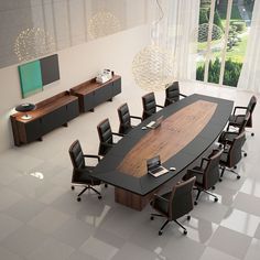 a large conference table with chairs around it