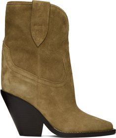 Find ISABEL MARANT ÉTOILE Taupe Leyane Boots on Editorialist. Ankle-high paneled calfskin suede boots in taupe. · Pointed toe · Pull-loops at collar · Grained calfskin lining in tan · Stacked leather heel with rubber injection · Leather outsole · Heel: H2 in Supplier color: Taupe Ankle Boots, Isabel Marant, Green Ankle Boots, Suede Boots, Leather Heels, Wedge Boot, Calf Skin, Apparel Accessories, Ankle Boot