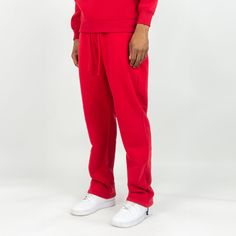 Our Solid Sweatpants are designed with both comfort and functionality in mind. Made with a solid color that never goes out of style, these sweatpants are perfect for any activity. Enjoy a comfortable fit and look great while staying active. Regular fit 100% Polyester Fleece Adjustable drawstring