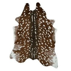 a brown and white animal skin rug