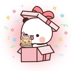 a hello kitty holding a birthday cake in a box