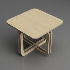 a wooden table with two intersecting legs and a square top on an isolated gray background