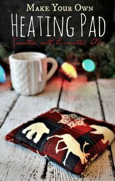 a coffee mug sitting on top of a wooden table next to a christmas tree with the words make your own heating pad