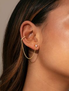 Can’t decide between a stud earring and hoop earring? Well now you don’t have to. Our Chain And Cuff Ear Climber puts every earring style you love into one earring. Featuring a triangle stud and a gold hoop ear cuff connected by a chain, this is the ear climber you can’t live without. Ear Climbers, Triangle Studs, Gold Hoop, Jewelry Cleaner, Cuff Earrings, Natural Skin, Cleaning Jewelry, Chain Lengths, Fashion Earrings