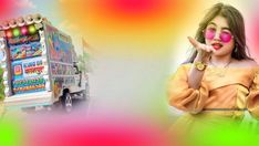 a woman standing in front of a truck giving the peace sign