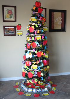 a christmas tree made out of paper and magnets