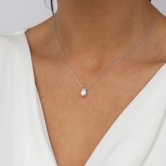 This delicate necklace features a single teardrop-shaped crystal hanging delicately from an elegant silver chain. The crystal is beautifully faceted, catching and reflecting light with every movement, while the silver chain adds an extra level of sparkle and sophistication. The perfect addition to any outfit, the Crystal Teardrop Necklace will add a touch of glamour and sophistication, making you look and feel your best. Matric Dance, Silver Drop Necklace, Crystal Hanging, Reflecting Light, Silver Diamond Necklace, Teardrop Necklace, White Crystal, Delicate Necklace, Necklace Sterling Silver