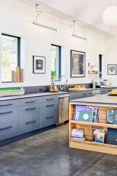 the kitchen is clean and ready to be used for cookbooks or other things in the house