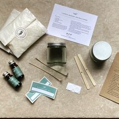 an assortment of crafting supplies laid out on a table