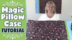 a woman holding up a quilt in front of her face and the words magic pillow case