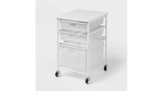 a white cart with three drawers on wheels