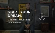 a man sitting on top of a chair in front of a wall with the words start your dream