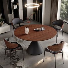 a dining table with chairs around it and a vase on the table next to it