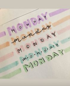 a piece of paper with the words monday written in different colors and font on it