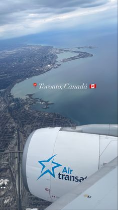 an airplane wing with the words toronto, canada on it