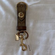 New , This Is Authentic Coach Bag Charm Key Holder. Price Is Firm. Please No Low Balling, This Is In Brand New Condition, Not Used. Brown Keychain Aesthetic, Luxury Coach Wallet On Chain, Classy Keychain, Wallet And Key Holder Coach, Car Keychain Aesthetic, Coach Bag Charm, Car Keys Keychain Ideas, Coach Keychain Wallet, Coach Aesthetic